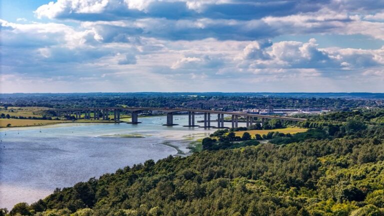 The River Orwell and the Orwell Bridge in Suffolk under a cloudy sky